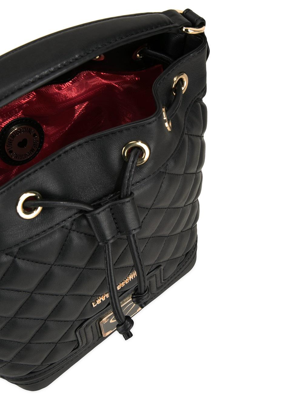 quilted drawstring crossbody bag