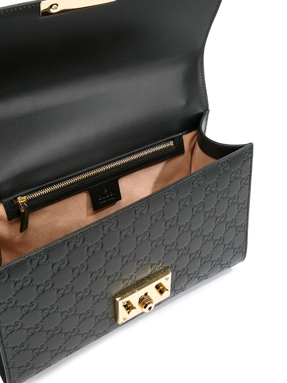 logo embossed shoulder bag