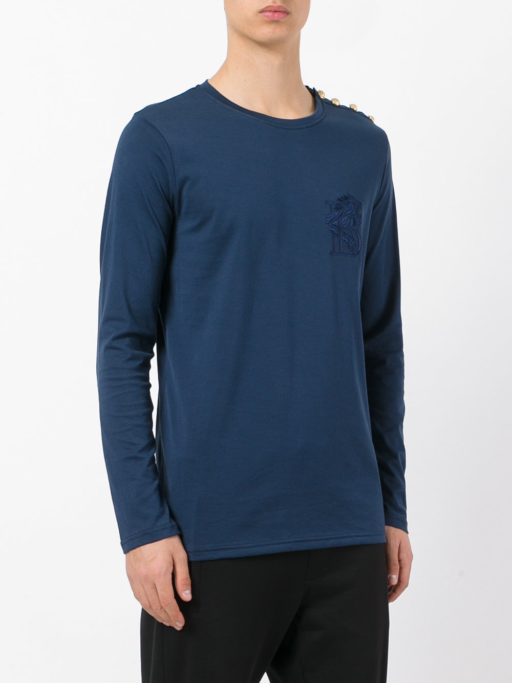 gold button logo top