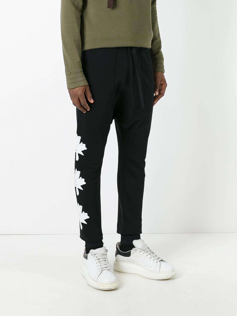 leaf print track pants
