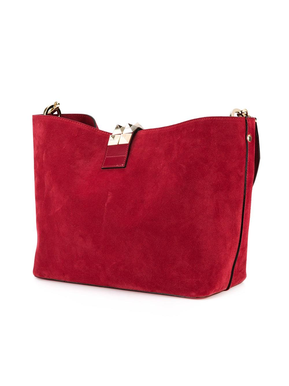 studded closure shoulder bag