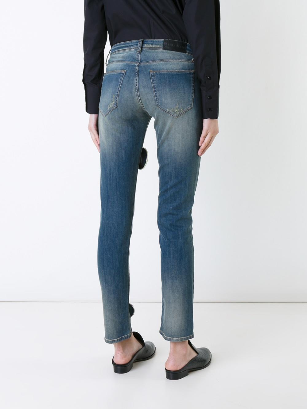 Robert Montgomery quote badge jeans