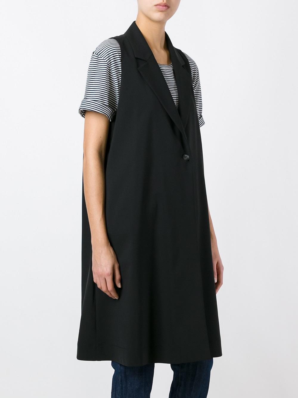 flared sleeveless midi coat