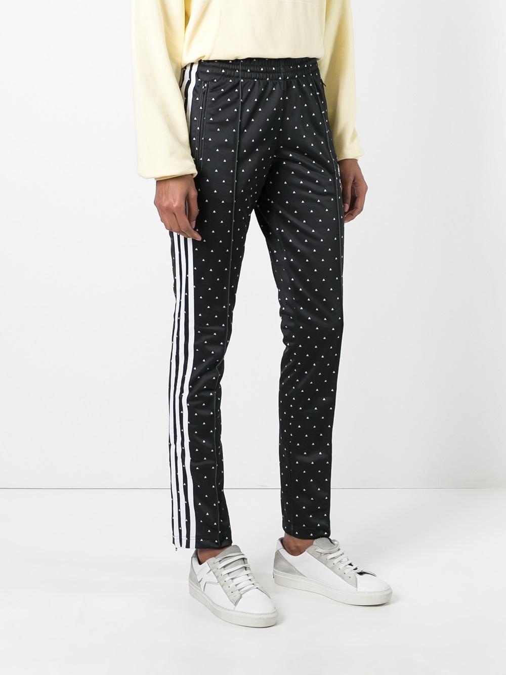 'Hu Race' printed track pants