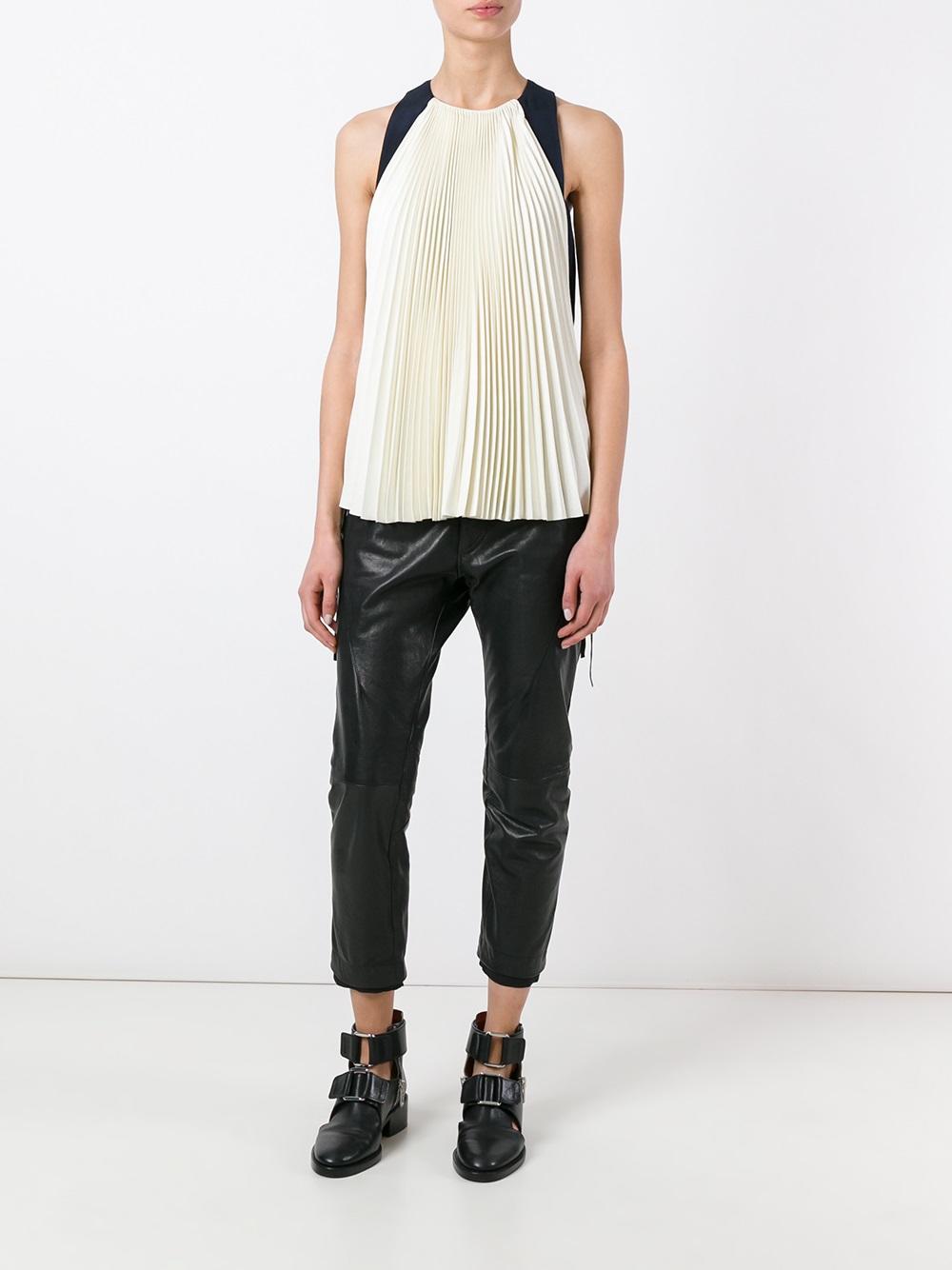 sleeveless pleated blouse